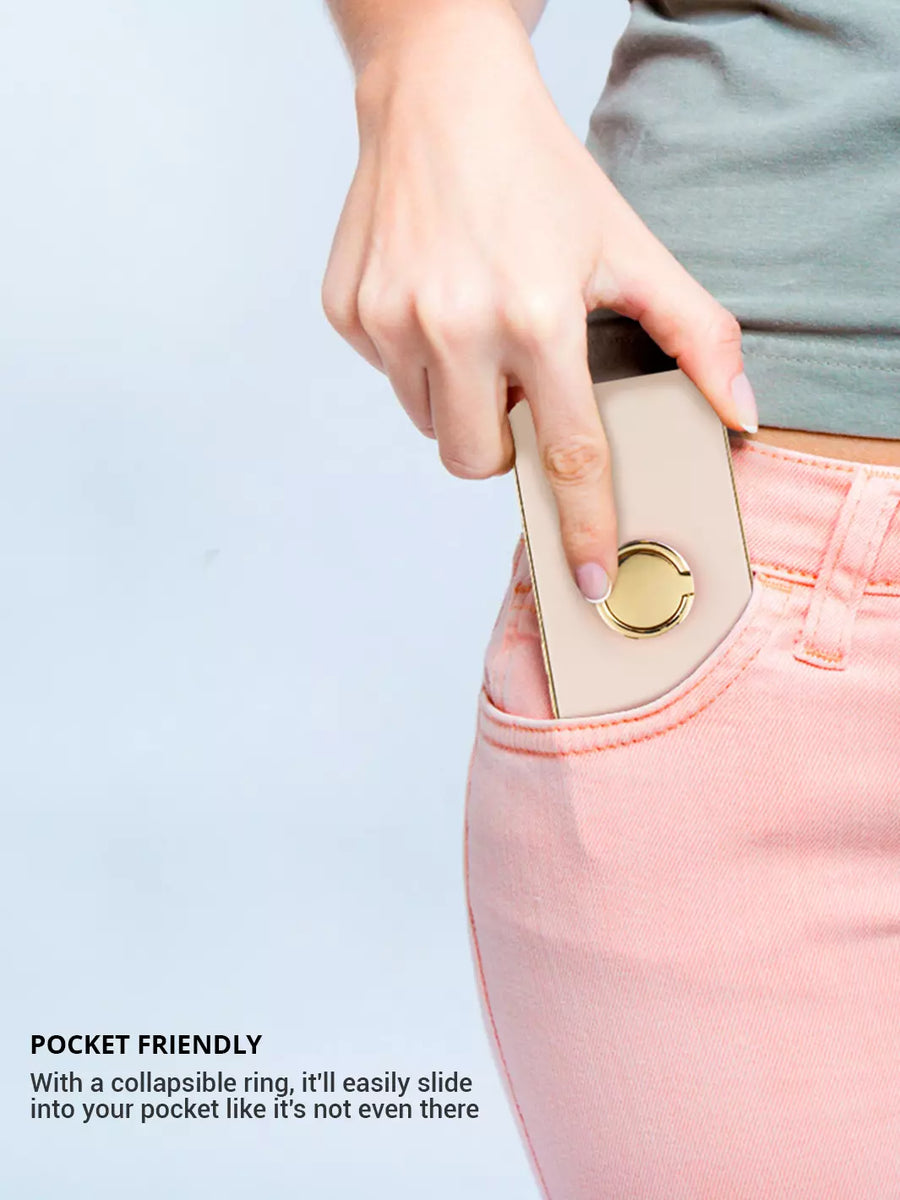 The gold phone ring attached to the iPhone slides easily into your pocket