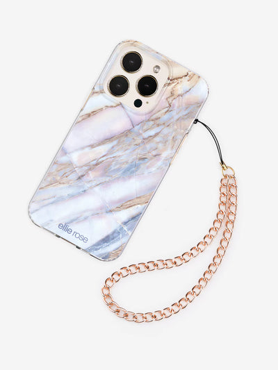 Rose gold phone wristlet charm latched to iPhone with desert marble case