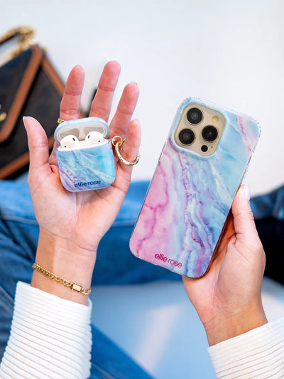 Mystic Journey Airpods case held in hand with iphone