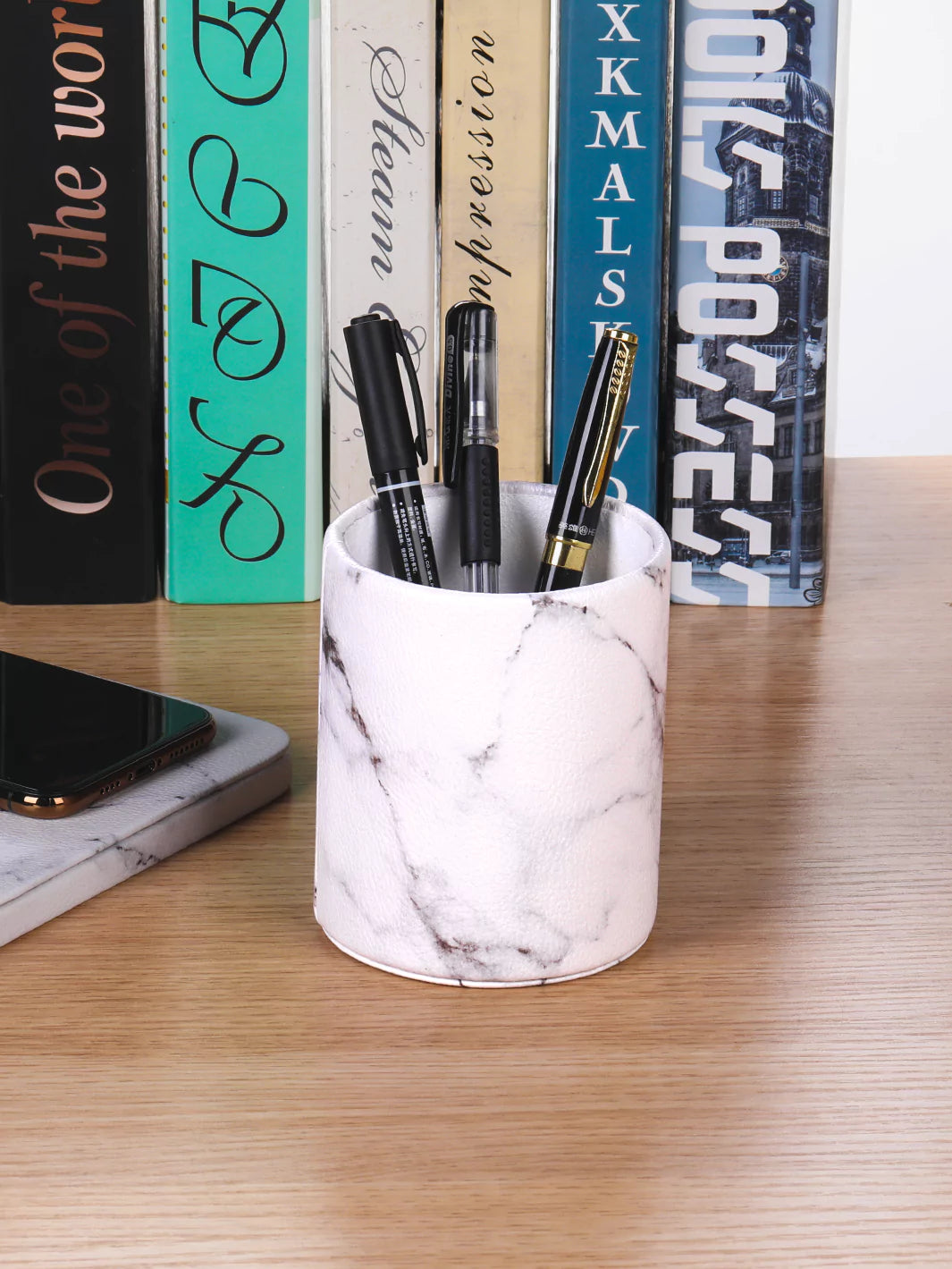 White Marble pen cup with ballpens and books