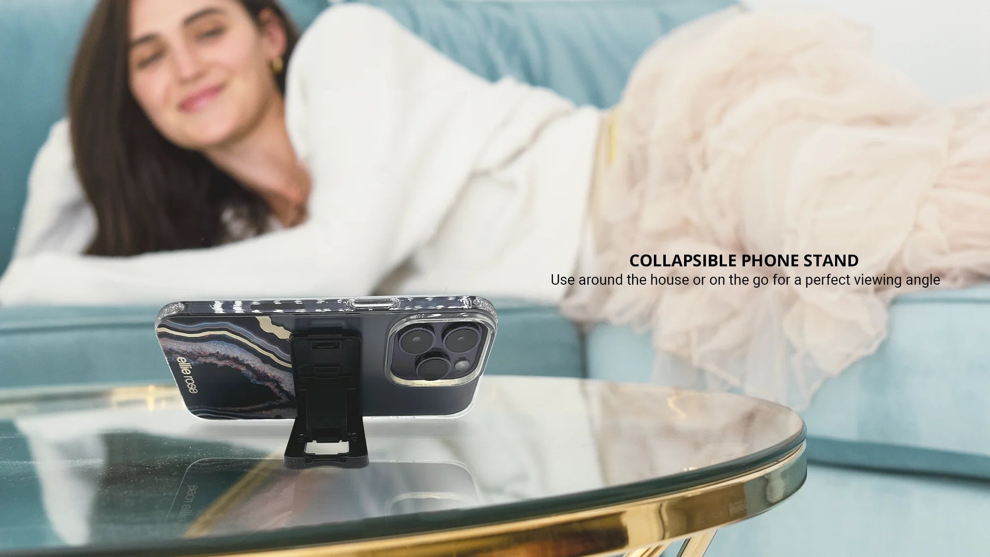 Showing collapsable phone stand with iphone while on sofa