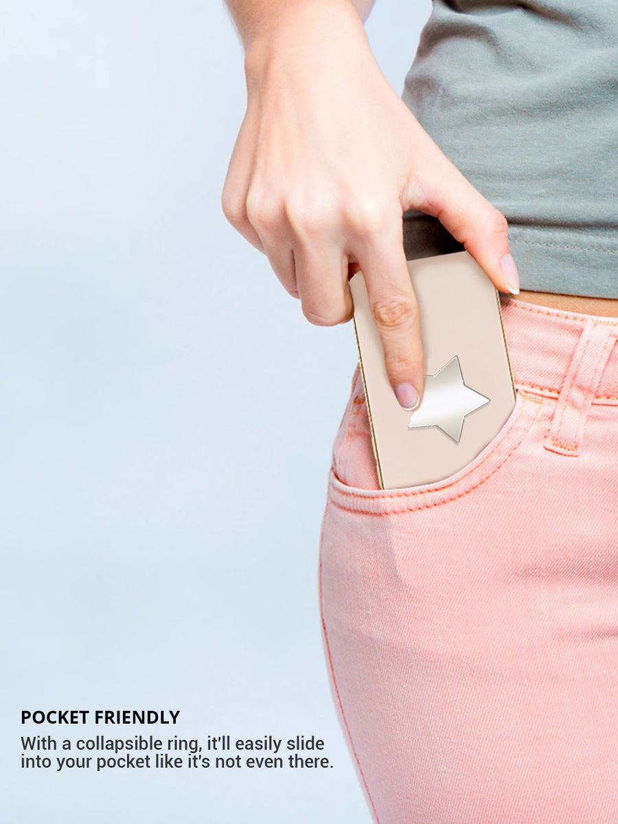 Putting an iphone into a pocket wearing pink jeans