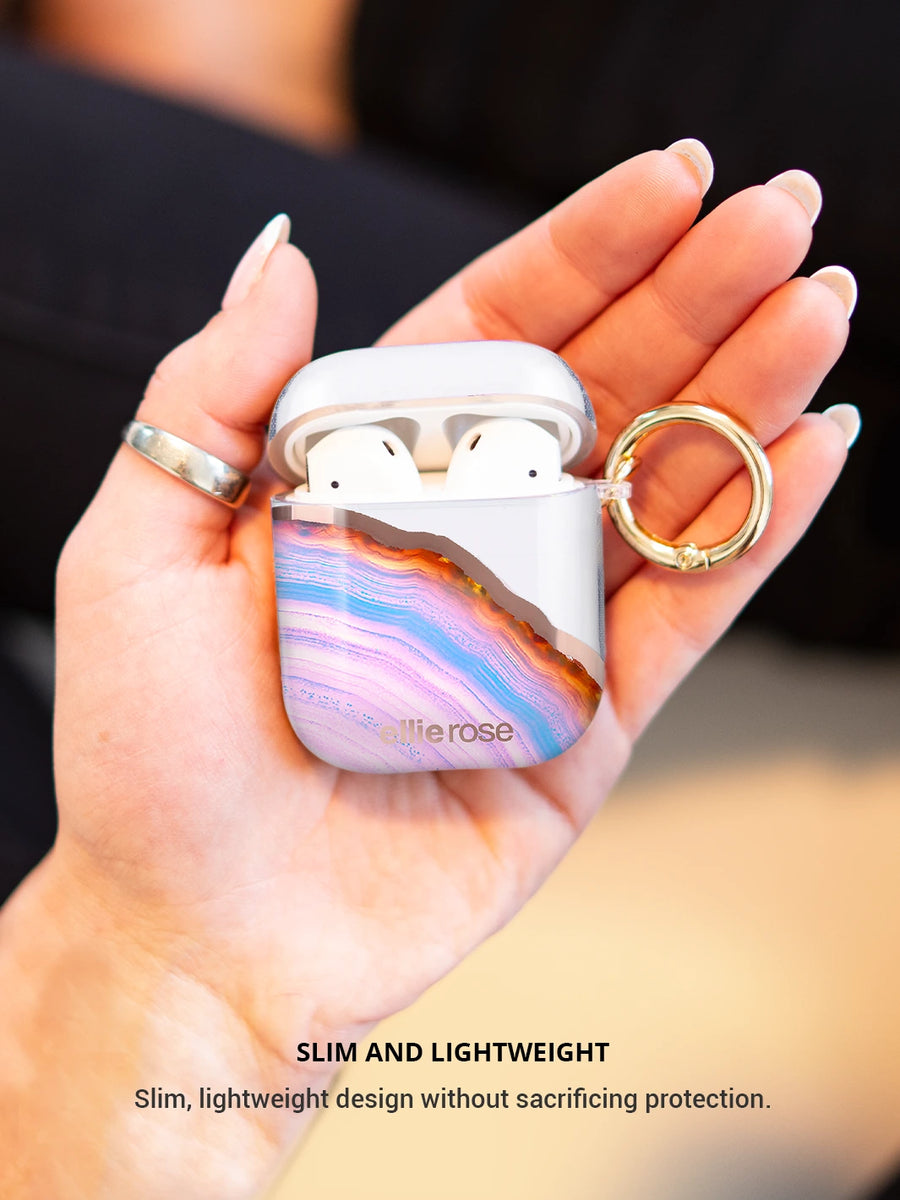 Candy agate airpods case with gold ring on hand