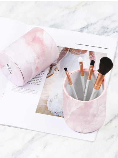 Pink Onyx pen cups with makeup brush  a white wedding paper