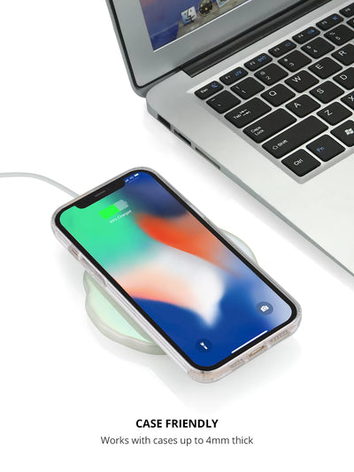 Charging an iPhone with Quartz Holographic Wireless Charger and a laptop