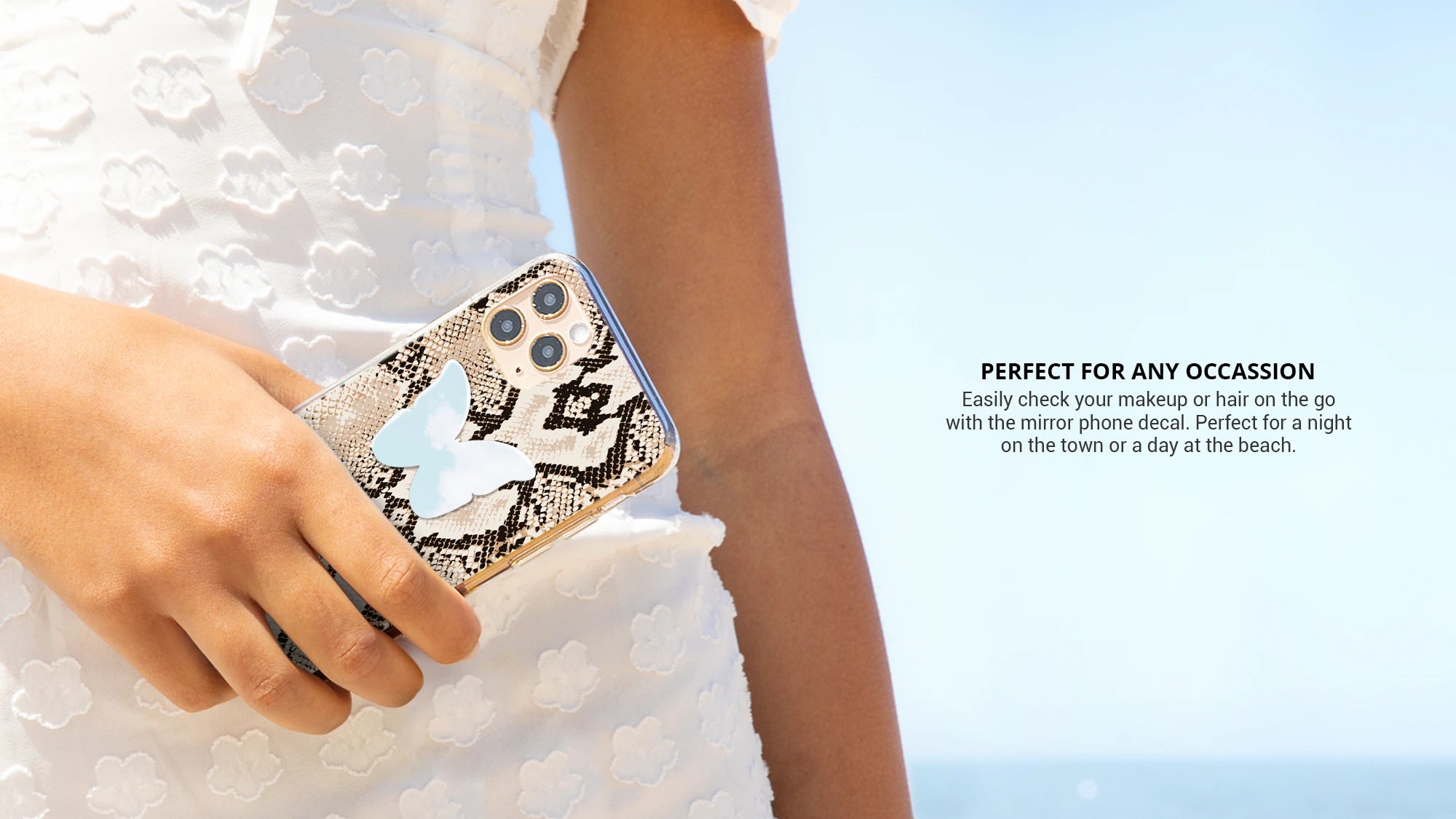 Snakeskin with stick on phone butterfly decal while wearing white dress