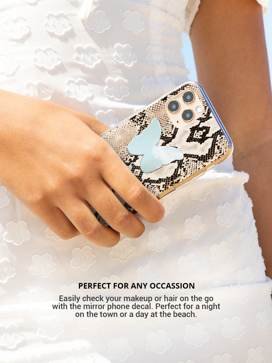 Snakeskin with stick on phone butterfly decal while wearing white dress