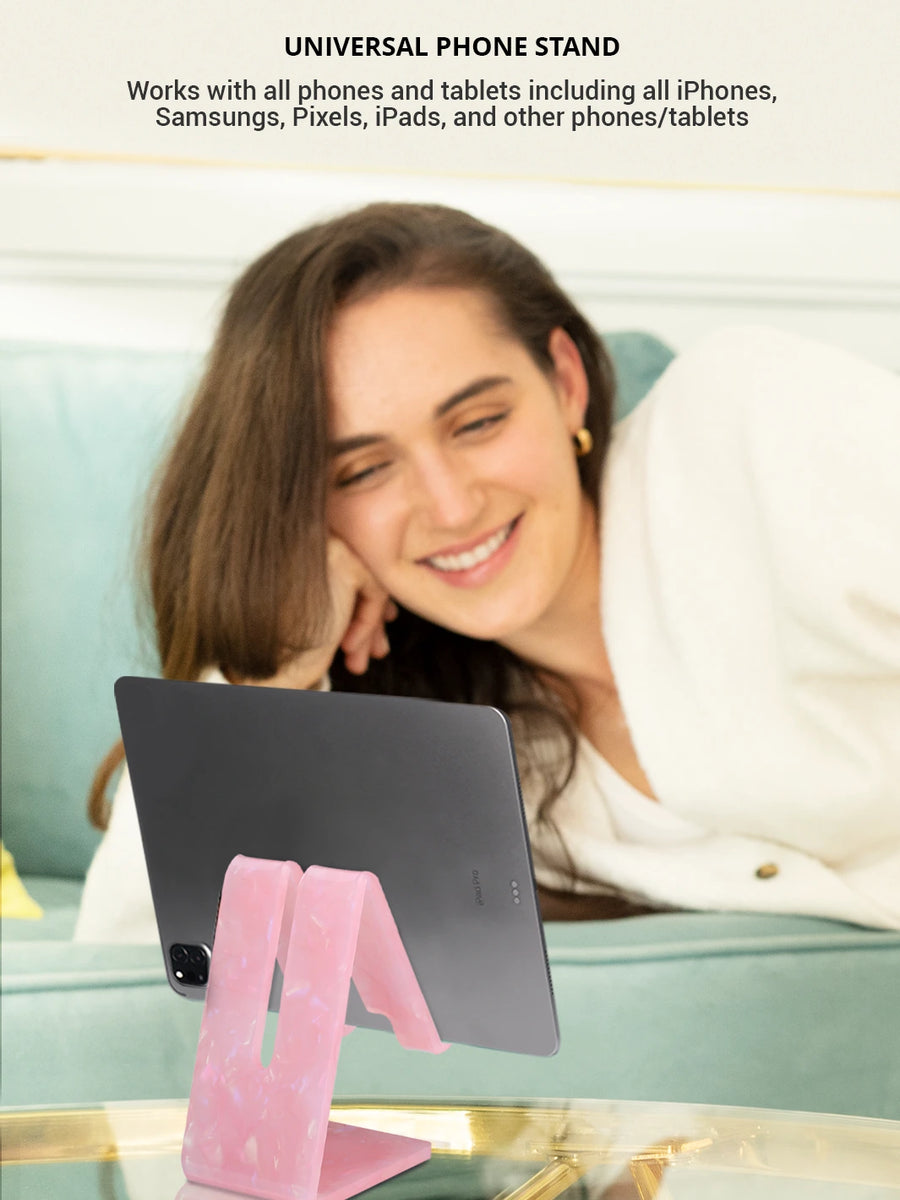 showing rose quartz phone and tablet stand holding an iPad