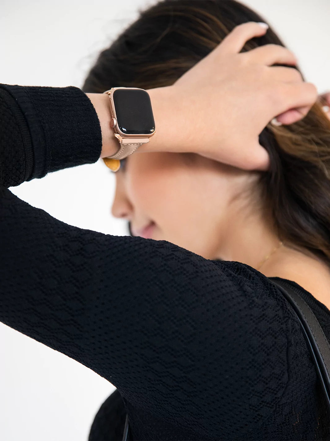 Showing Leather Apple Watch Band  while led is off wearing black long sleeves