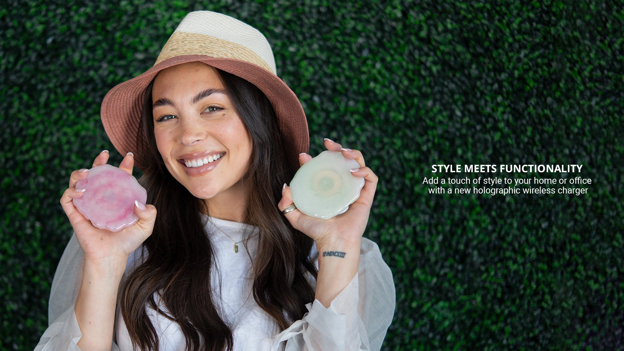 Showing 2 pieces holographic wireless charger while wearing beach hat