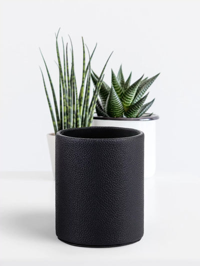  Black Faux leather pen cup with green mini plants at the back