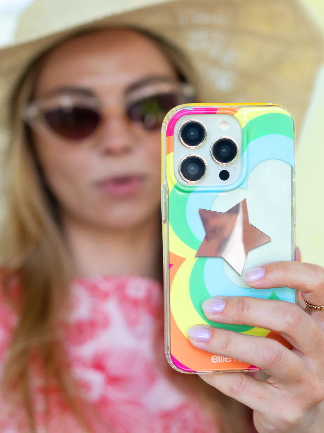 Taking a selfie from an iPhone with Star stick on phone mirror decal