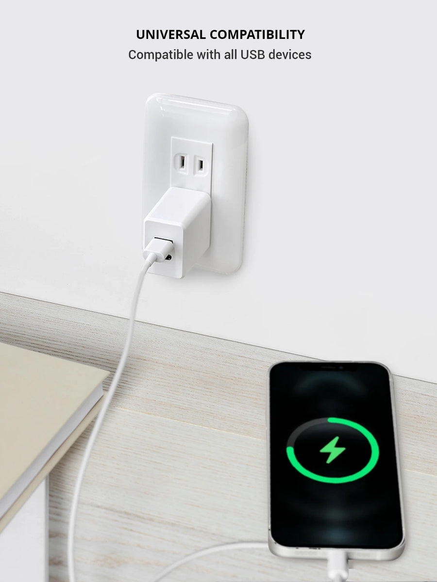 Charging an iphone using white wall charger usb device