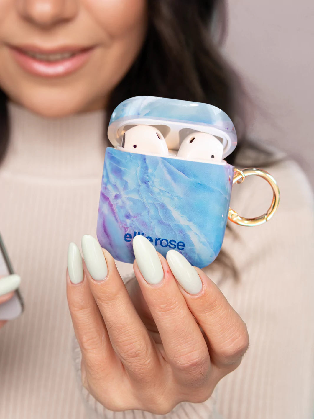 Opening of Mystic Journey airpods case in hand front view