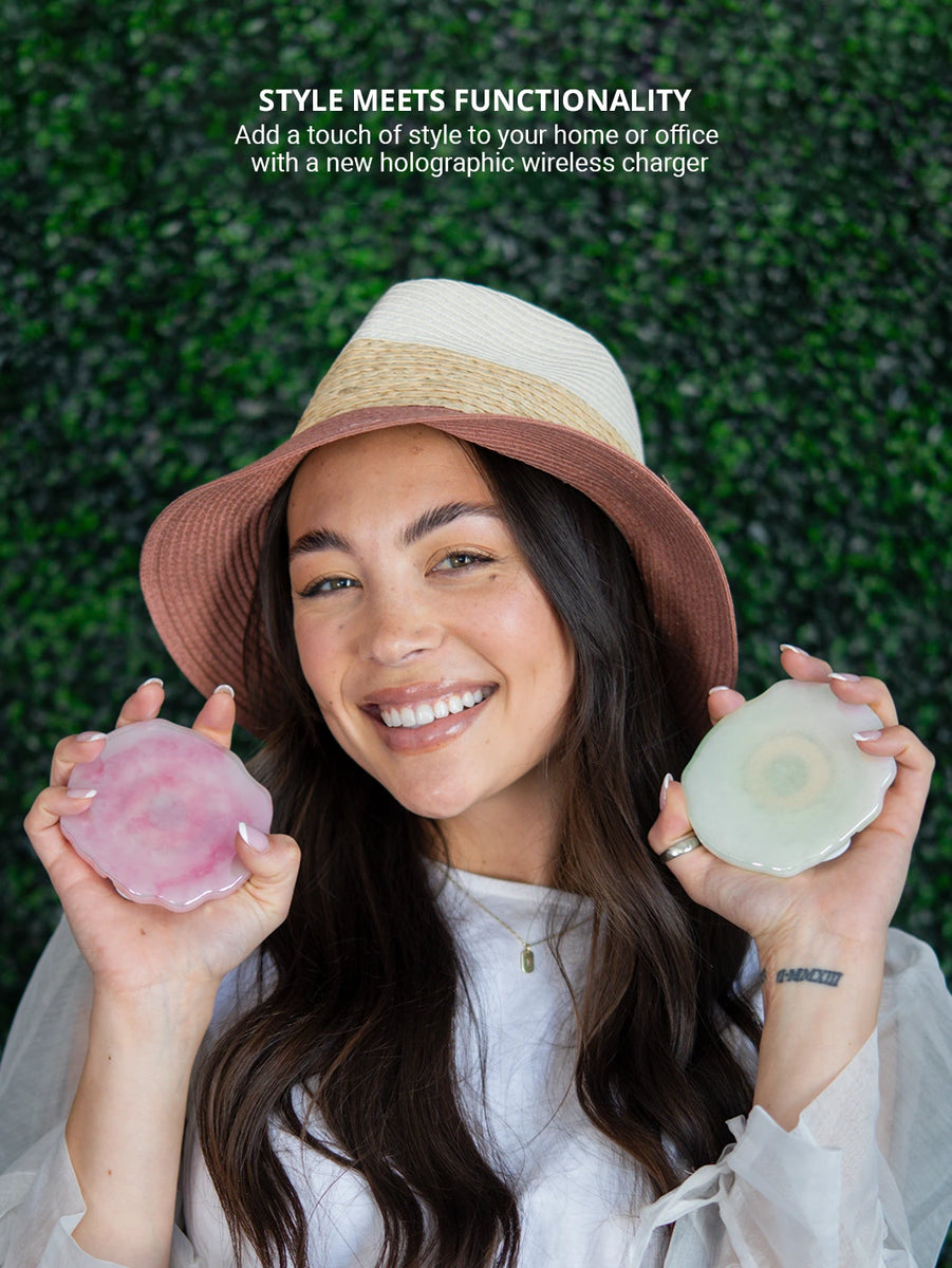 Showing 2 pieces holographic wireless charger while wearing beach hat