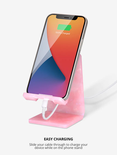 Rose Quartz phone stand while charging an iPhone