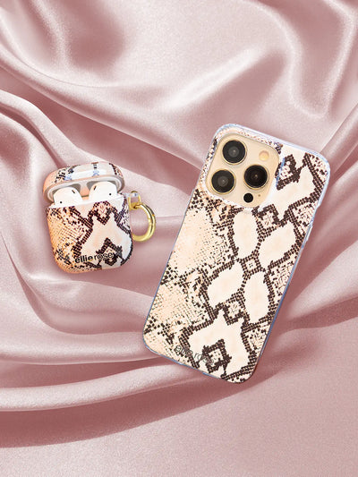 Snakeskin AirPods Case together with iphone on pink background