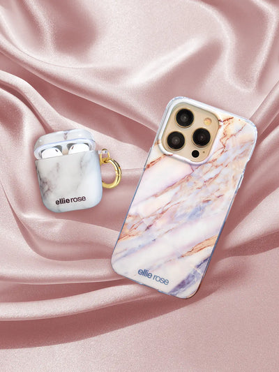 White Marble Airpods case together with iphone on pink background